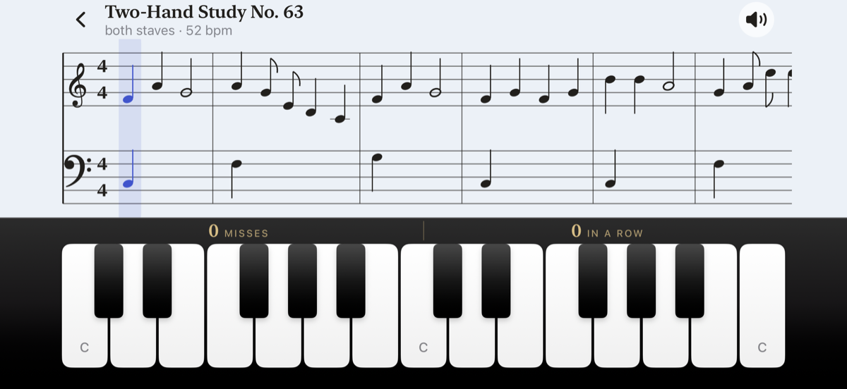 A two-hand study on the grand staff in landscape, with a wide piano keyboard below